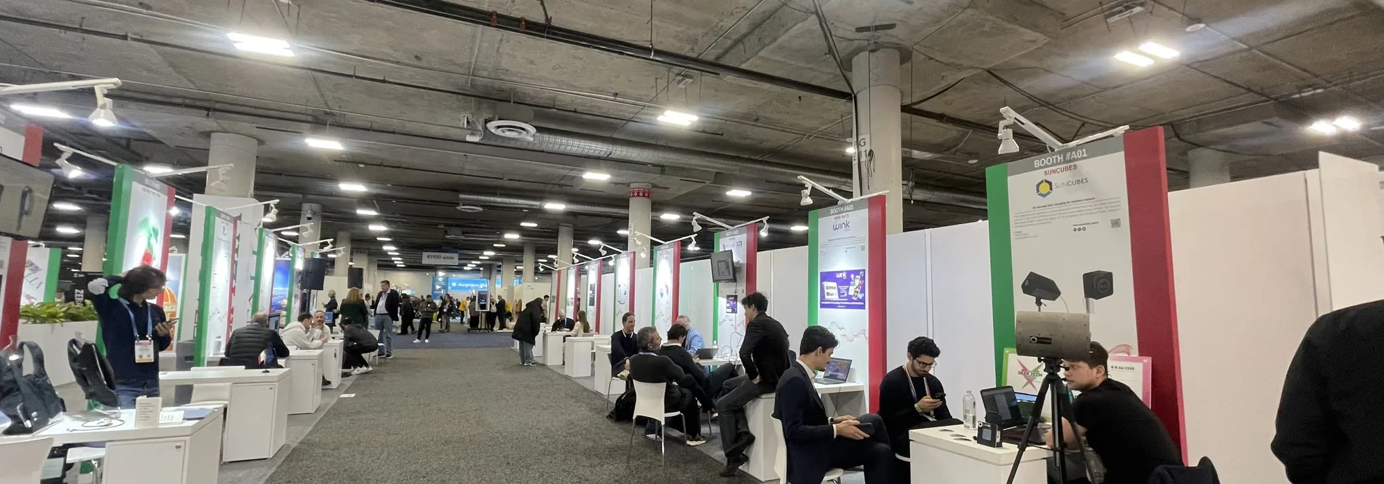 Booths lining an aisle on the CES 2026 show floor